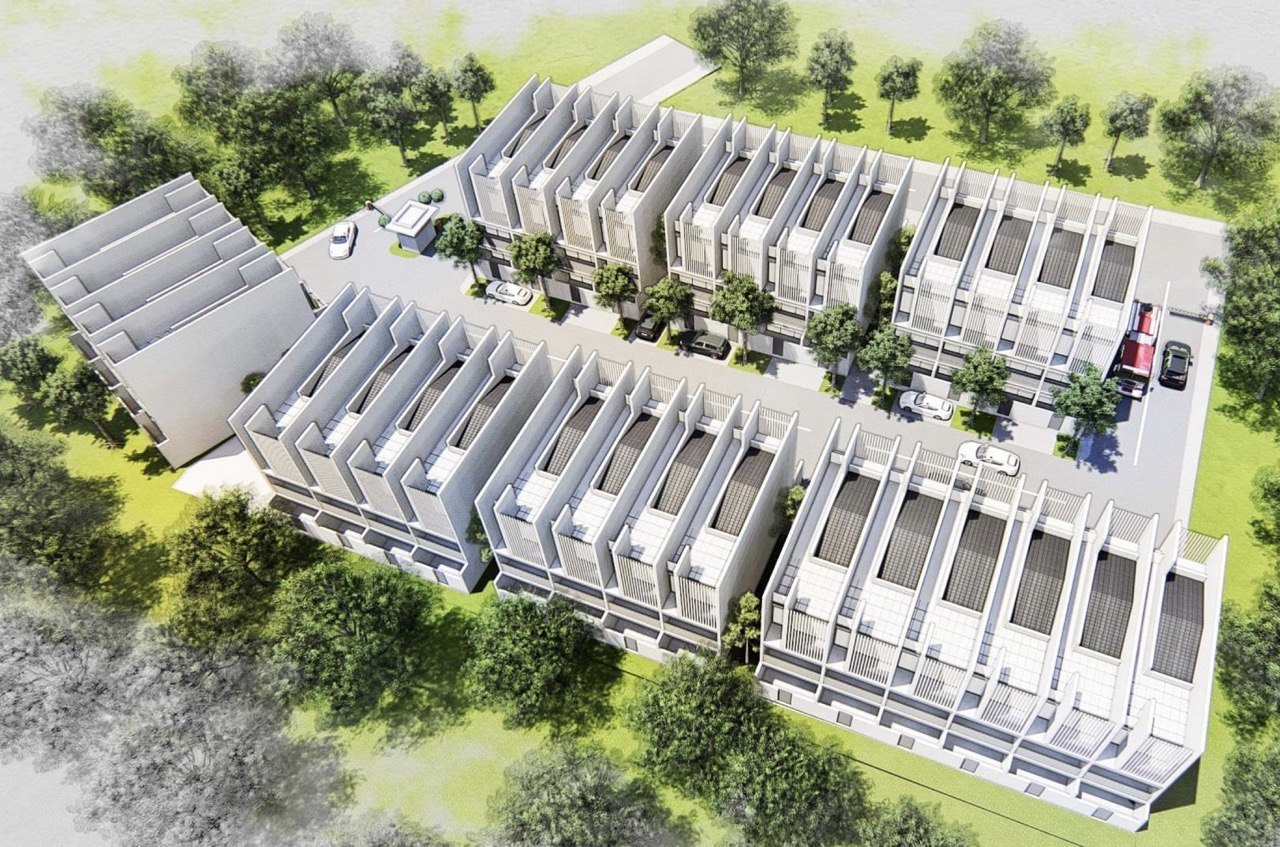 Build idea showing clustered townhouse blocks in a green setting