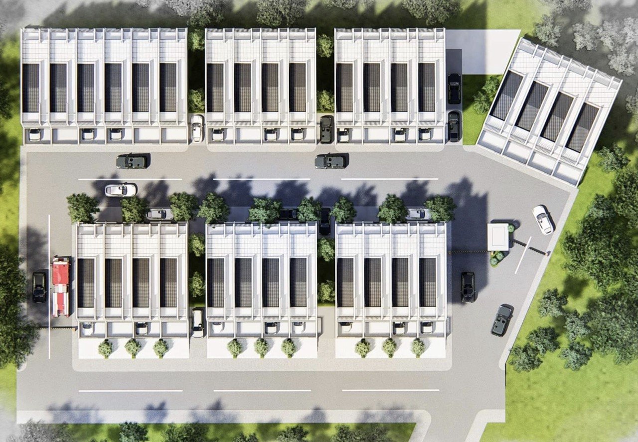 Build idea showing one possible townhouse-style site plan for the property